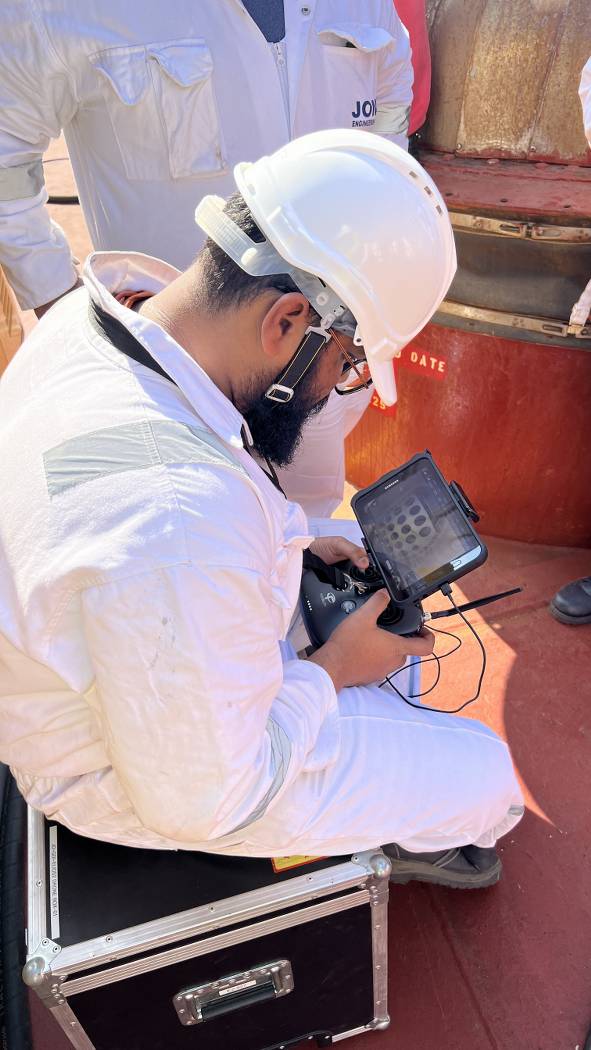 Drone Pilot inspecting 